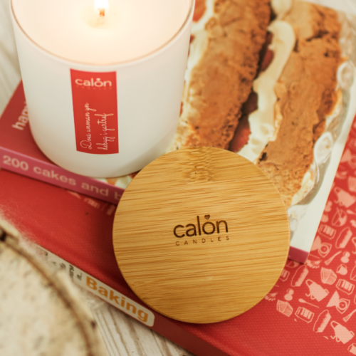 a branded engraved lid with Calon Candles logo