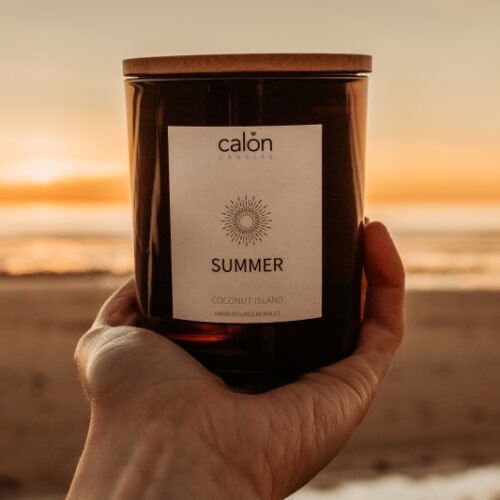 Coconut Island summer candle with lid on sunset beach